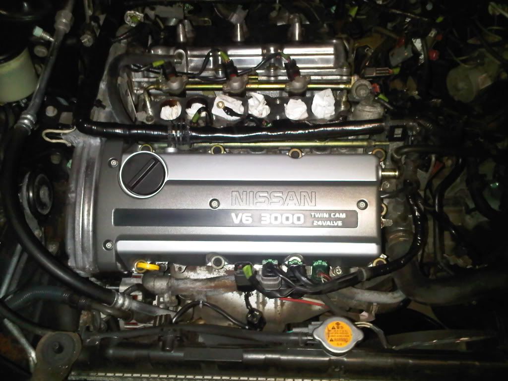 Change valve cover gaskets 1995 nissan maxima